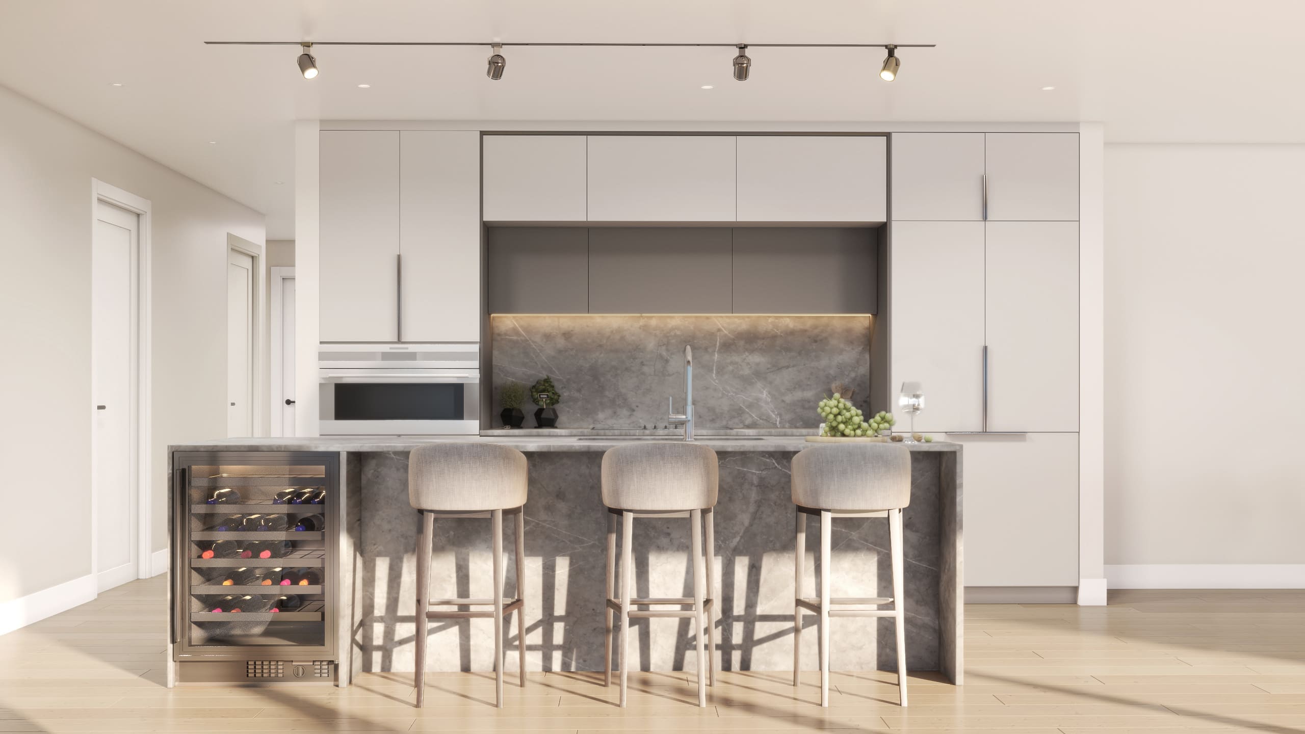 Cuisine luxueuse, avec planchers de bois chêne blanc, comptoirs Dekton et cellier