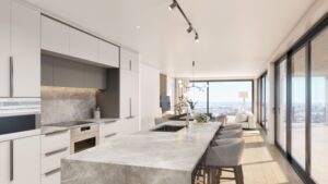 Cuisine moderne avec électroménagers Fulgor Milano et salon lumineux